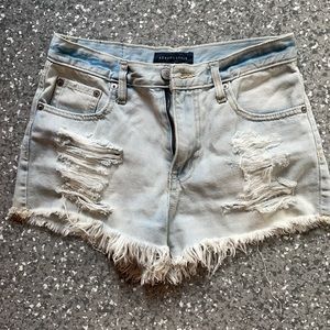 Light wash denim cut off short
